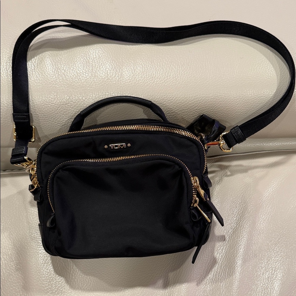 Tumi Black and Gold Crossbody Bag
